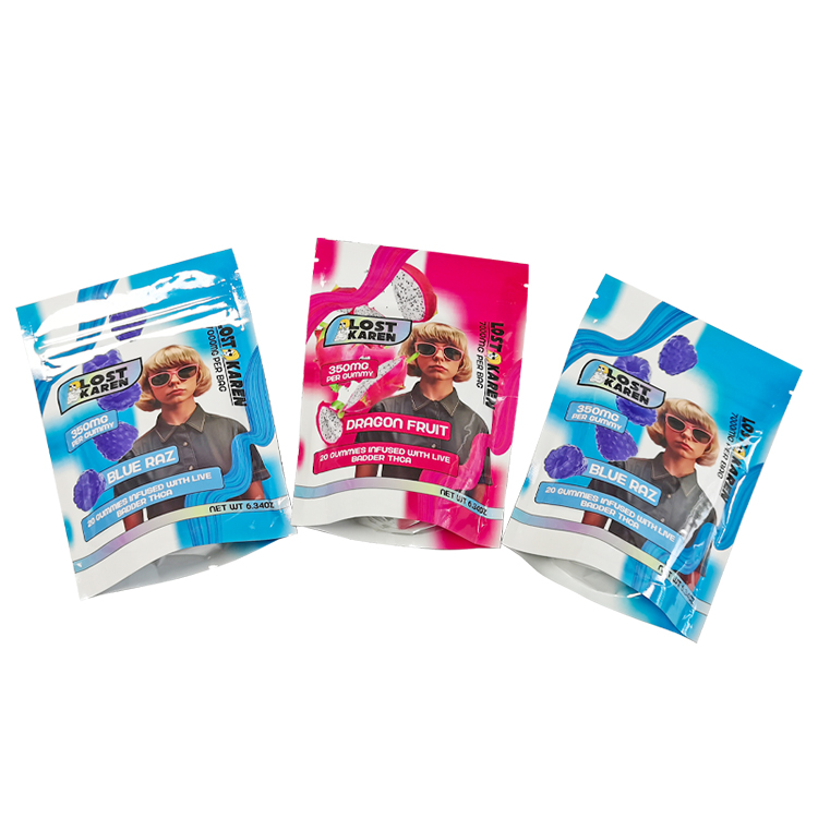 Three printed pouches showing coordinated pink and blue packaging artwork